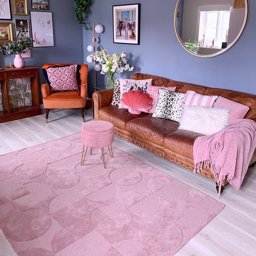 Should Sofa Cushions Match a Rug?