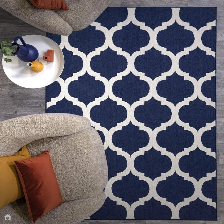 Modernizing Your Dining Room with a White and Blue Rug