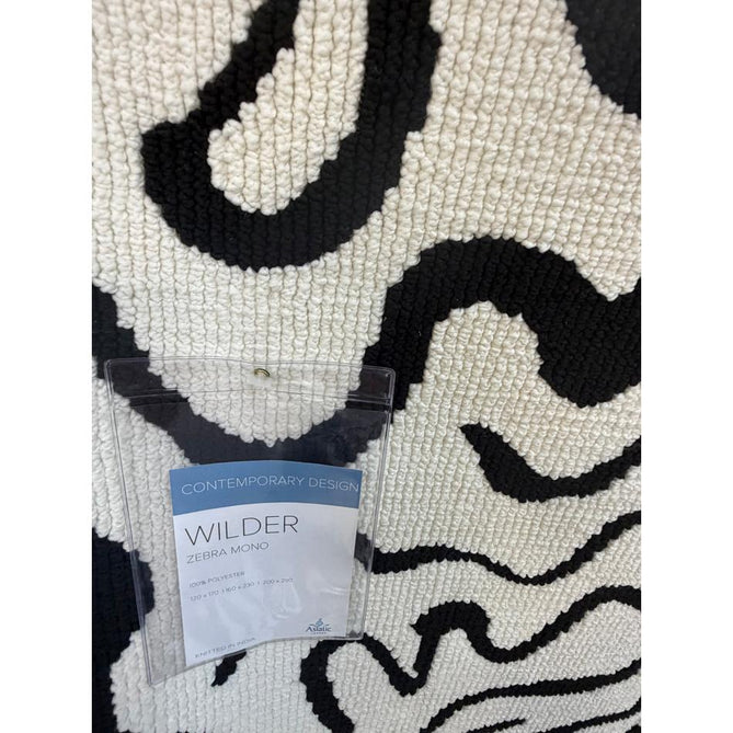 Wilder Zebra Modern Animal-Inspired Textured Soft-Touch Knitted Polyester Shimmer Durable Easy-Care Low Profile Short Pile Mono/White/Black Rug