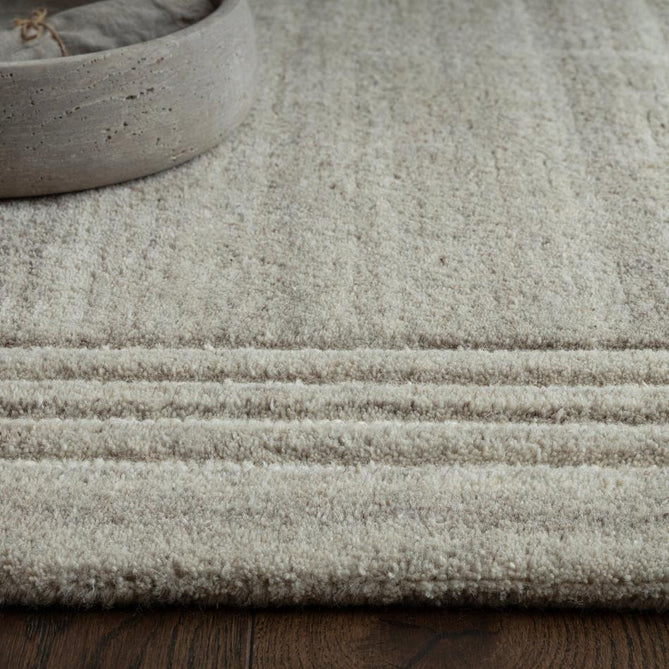 Orlo Modern Plain Tonal Variation Hand-Carved Hi-Lo Loop Pile Border Natural Undyed Wool Soft Grey Rug