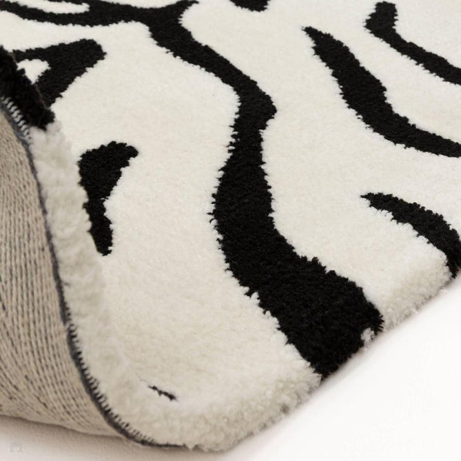 Wilder Tiger Modern Animal-Inspired Textured Soft-Touch Knitted Polyester Shimmer Durable Easy-Care Low Profile Short Pile Mono/White/Black Rug-Asiatic Carpets-Rug Love - The Most Loved Rug Store