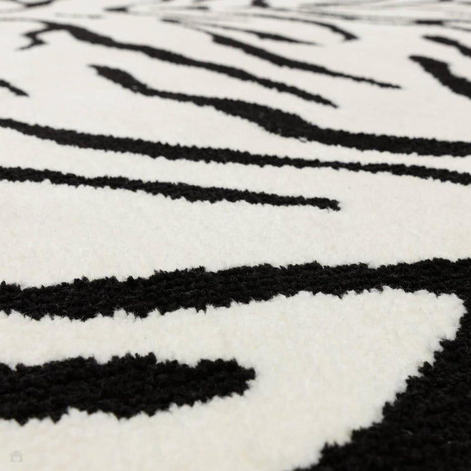 Wilder Tiger Modern Animal-Inspired Textured Soft-Touch Knitted Polyester Shimmer Durable Easy-Care Low Profile Short Pile Mono/White/Black Rug-Asiatic Carpets-Rug Love - The Most Loved Rug Store
