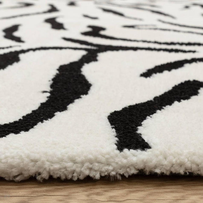 Wilder Tiger Modern Animal-Inspired Textured Soft-Touch Knitted Polyester Shimmer Durable Easy-Care Low Profile Short Pile Mono/White/Black Rug-Asiatic Carpets-Rug Love - The Most Loved Rug Store