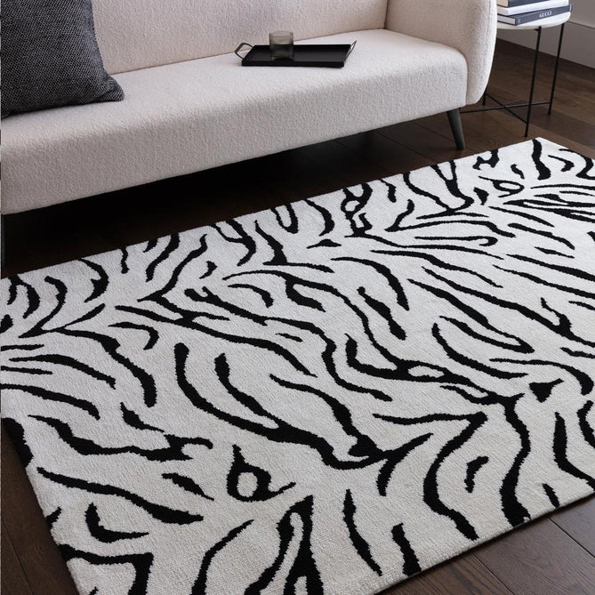 Wilder Tiger Modern Animal-Inspired Textured Soft-Touch Knitted Polyester Shimmer Durable Easy-Care Low Profile Short Pile Mono/White/Black Rug