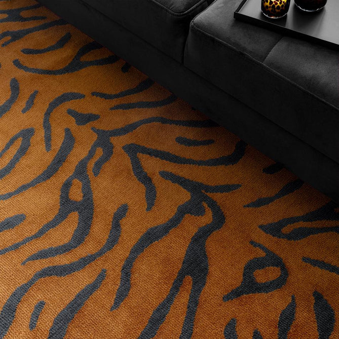 Wilder Tiger Modern Animal-Inspired Textured Soft-Touch Knitted Polyester Shimmer Durable Easy-Care Low Profile Short Pile Spice Orange/Charcoal Black Rug